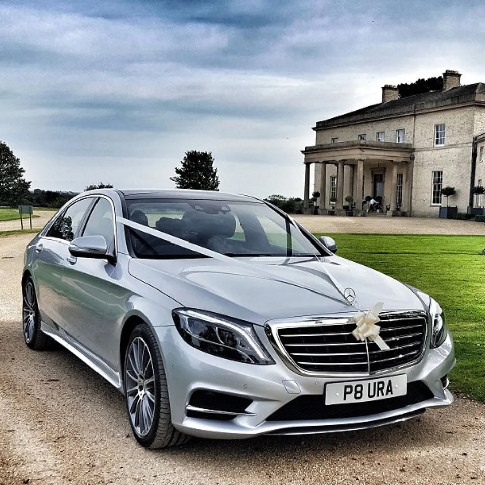 A silver Mercedes for wedding chauffeur service