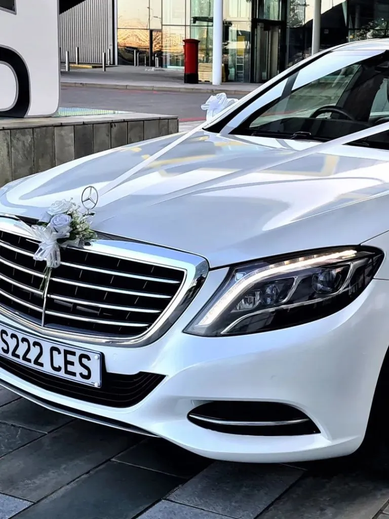 white wedding chauffeur car
