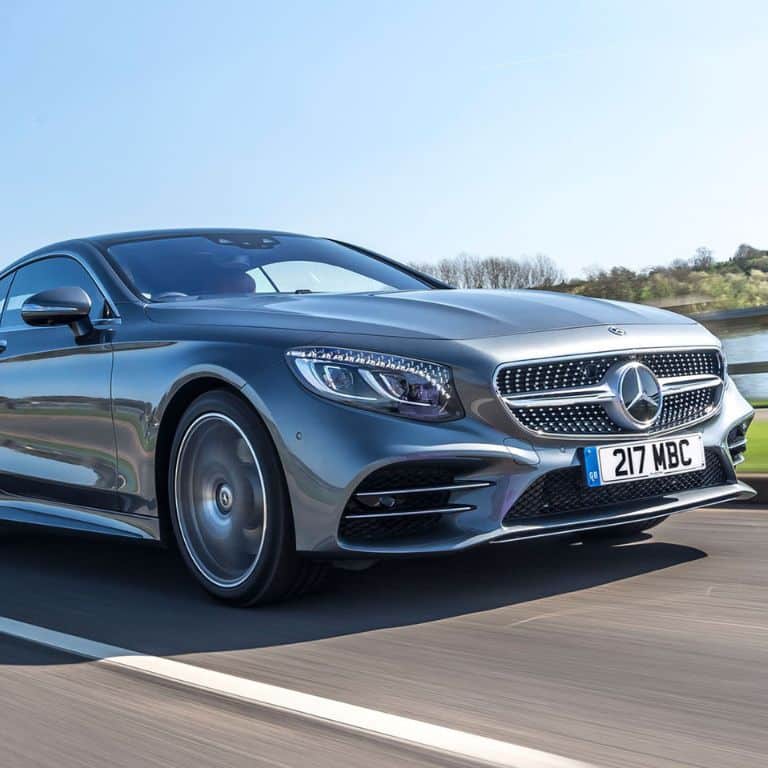 A silver Mercedes Benz for bna airport chauffeur service